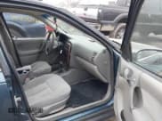 ✅ 2002 Saturn LW • VIN: 1G8JU84F12Y566883 • Lot: 43757094. Listed on IAAI with 215,469 mi. Free auction sales archive from the USA and detailed vehicle history report at DreamBid. Image 5.