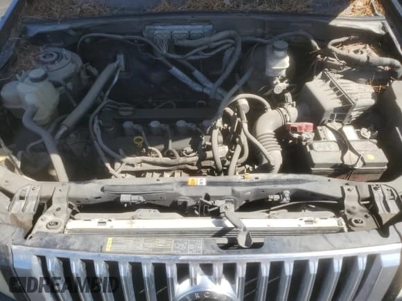 ✅ 2010 Mercury Mariner Premier • VIN: 4M2CN8H73AKJ06652 • Lot: 61690555. Listed on Copart with 202,434 mi. Free auction sales archive from the USA and detailed vehicle history report at DreamBid. Image 12.