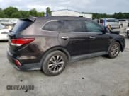✅ 2017 Hyundai Santa Fe SE • VIN: KM8SN4HF8HU174537 • Лот: 56275603. Опубликован ранее на Copart с пробегом 96 698 миль. Бесплатный доступ к архиву аукционных продаж из США и подробный отчёт об истории автомобиля на DreamBid. Изображение 3.