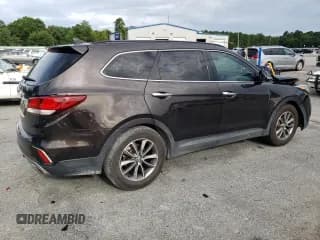 ✅ 2017 Hyundai Santa Fe SE • VIN: KM8SN4HF8HU174537 • Лот: 56275603. Опубликован ранее на Copart с пробегом 96 698 миль. Бесплатный доступ к архиву аукционных продаж из США и подробный отчёт об истории автомобиля на DreamBid. Изображение 3.