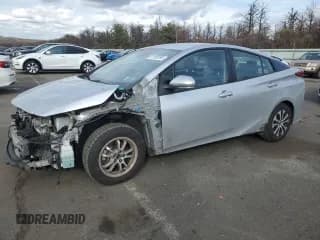 ✅ 2021 Toyota Prius LE • VIN: JTDKAMFP3M3166535 • Лот: 91198785. Опубликован ранее на Copart с пробегом 232 270 миль. Бесплатный доступ к архиву аукционных продаж из США и подробный отчёт об истории автомобиля на DreamBid. Изображение 1.