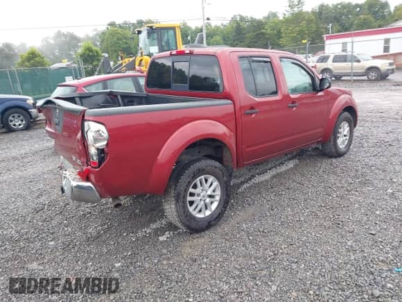 2016 Nissan Frontier SV with VIN 1N6AD0EV0GN723676, listed as a IAAI auction lot 43140977 with 172,550 mi miles and . Bid and sale history available at DreamBid. Image 4.