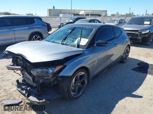 2020 Hyundai Veloster Turbo R-Spec z VIN KMHTH6AB5LU029382, wystawiony jako IAAI lot #41751666 z przebiegiem 71 179 mil mil oraz . Historia ofert i sprzedaży dostępna na DreamBid. Obrazek 2.