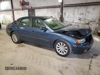 2009 Hyundai Azera GLS z VIN KMHFC46D89A349297, wystawiony jako Copart lot #85777694 z przebiegiem 103 647 mil mil oraz Szkoda całkowita • Salvage title. Historia ofert i sprzedaży dostępna na DreamBid. Obrazek 4.