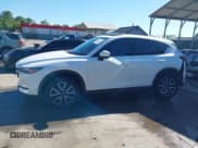 ✅ 2017 Mazda CX-5 Grand Touring • VIN: JM3KFBDL4H0188600 • Lot: 42202079. Listed on IAAI with 101,157 mi. Free auction sales archive from the USA and detailed vehicle history report at DreamBid. Image 14.