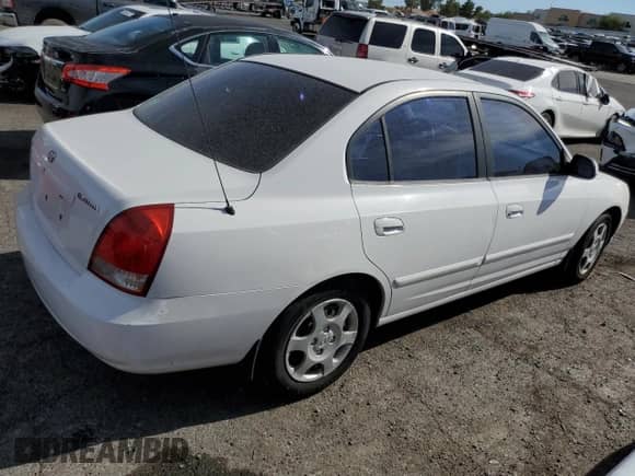 2003 Hyundai Elantra GLS z VIN KMHDN45D03U580901, wystawiony jako Copart lot #78920904 z przebiegiem 75 346 mil mil oraz Czysty tytuł • Clean title. Historia ofert i sprzedaży dostępna na DreamBid. Obrazek 3.