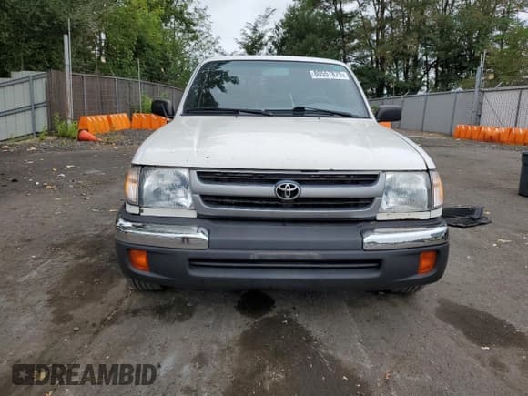 ✅ 1999 Toyota Tacoma • VIN: 4TAVL52N0XZ570861 • Lot: 80557875. Listed on Copart with 274,648 mi. Free auction sales archive from the USA and detailed vehicle history report at DreamBid. Image 5.