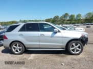 ✅ 2019 Mercedes-Benz GLE 400 • VIN: 4JGDA5GB1KB211102 • Lot: 42145350. Listed on IAAI with 54,781 mi. Free auction sales archive from the USA and detailed vehicle history report at DreamBid. Image 13.