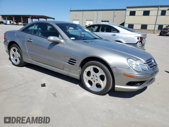✅ 2005 Mercedes-Benz SL 500 • VIN: WDBSK75F45F098073 • Лот: 73401994. Опубликован ранее на Copart с пробегом 83 860 миль. Бесплатный доступ к архиву аукционных продаж из США и подробный отчёт об истории автомобиля на DreamBid. Изображение 4.