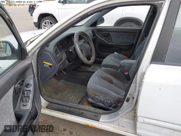 ✅ 2001 Hyundai Elantra GLS • VIN: KMHDN45D51U054762 • Lot: 43640400. Listed on IAAI with 213,721 mi. Free auction sales archive from the USA and detailed vehicle history report at DreamBid. Image 5.