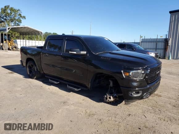 2019 Ram 1500 Big Horn with VIN 1C6SRFFTXKN751915, listed as a Copart auction lot 86119055 with 130,204 mi miles and Salvage title. Bid and sale history available at DreamBid. Image 4.