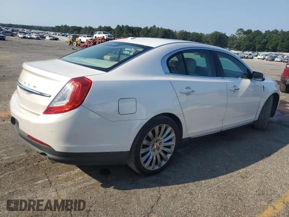 ✅ 2015 Lincoln MKS • VIN: 1LNHL9DK9FG604877 • Lot: 81421765. Wystawiony na Copart z przebiegiem 127 734 mil. Bezpłatny archiwum sprzedaży aukcyjnych z USA i szczegółowy raport historii pojazdu na DreamBid. Zdjęcie 3.