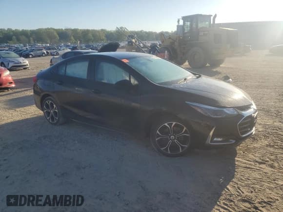 ✅ 2019 Chevrolet Cruze LT • VIN: 1G1BE5SM9K7123404 • Lot: 46878233. Listed on Copart with 81,717 mi. Free auction sales archive from the USA and detailed vehicle history report at DreamBid. Image 4.