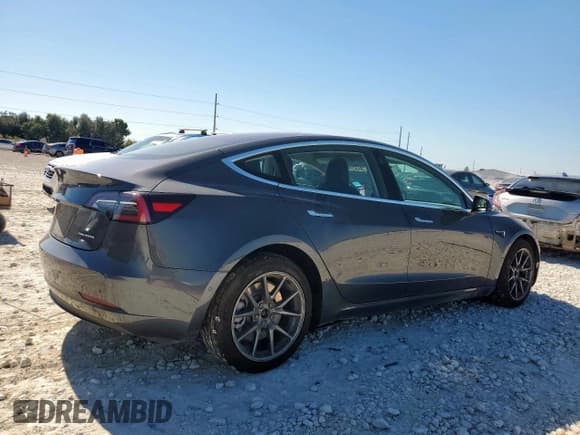 ✅ 2018 Tesla Model 3 Long Range Battery • VIN: 5YJ3E1EBXJF129042 • Lot: 91327865. Listed on Copart with 52,400 mi. Free auction sales archive from the USA and detailed vehicle history report at DreamBid. Image 3.