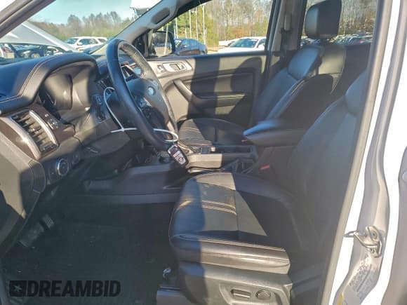 ✅ 2020 Ford Ranger Lariat • VIN: 1FTER4FH7LLA16800 • Lot: 94182395. Wystawiony na Copart z przebiegiem 106 047 mil. Bezpłatny archiwum sprzedaży aukcyjnych z USA i szczegółowy raport historii pojazdu na DreamBid. Zdjęcie 7.