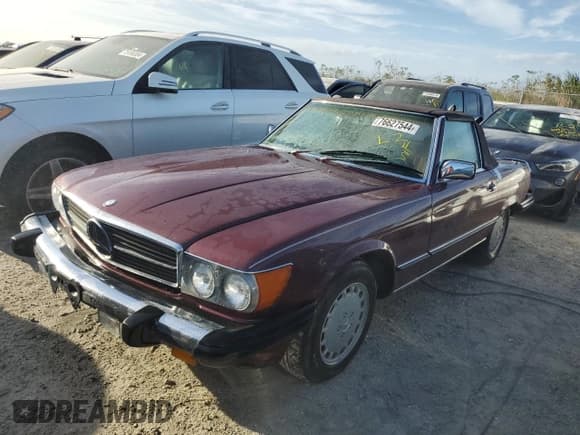 ✅ 1987 Mercedes-Benz 560 SL • VIN: WDBBA48D0HA059591 • Lot: 76627544. Wystawiony na Copart z przebiegiem 57 059 mil. Bezpłatny archiwum sprzedaży aukcyjnych z USA i szczegółowy raport historii pojazdu na DreamBid. Zdjęcie 1.