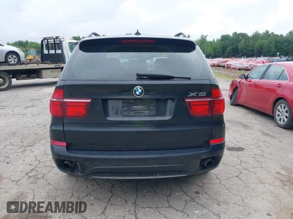 ✅ 2011 BMW X5 35i • VIN: 5UXZV4C57BL740975 • Lot: 42672015. Listed on IAAI with 165,816 mi. Free auction sales archive from the USA and detailed vehicle history report at DreamBid. Image 15.