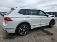 ✅ 2023 Volkswagen Tiguan SEL R-Line • VIN: 3VV4B7AXXPM029983 • Лот: 84759205. Опубликован ранее на Copart с пробегом 23 925 миль. Бесплатный доступ к архиву аукционных продаж из США и подробный отчёт об истории автомобиля на DreamBid. Изображение 3.