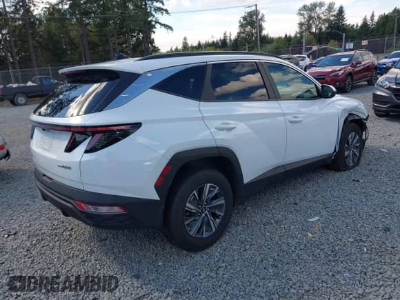 2023 Hyundai Tucson Blue z VIN KM8JBCA1XPU113640, wystawiony jako IAAI lot #42843566 z przebiegiem 56 035 mil mil oraz . Historia ofert i sprzedaży dostępna na DreamBid. Obrazek 4.