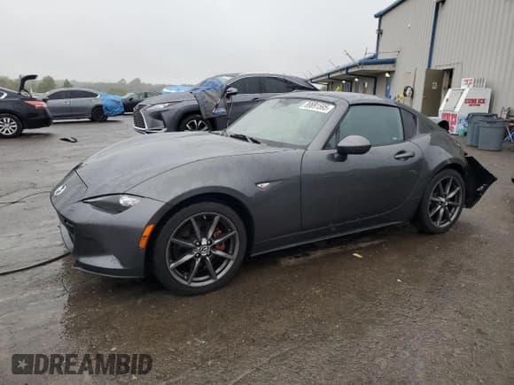 ✅ 2019 Mazda MX-5 Miata Grand Touring • VIN: JM1NDAM70K0300373 • Lot: 89691595. Listed on Copart with 121,485 mi. Free auction sales archive from the USA and detailed vehicle history report at DreamBid. Image 1.