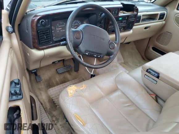 1997 Dodge 1500 z VIN 3B7HC13Y0VG727675, wystawiony jako Copart lot #77764714 z przebiegiem 80 497 mil mil oraz Szkoda całkowita • Salvage title. Historia ofert i sprzedaży dostępna na DreamBid. Obrazek 8.