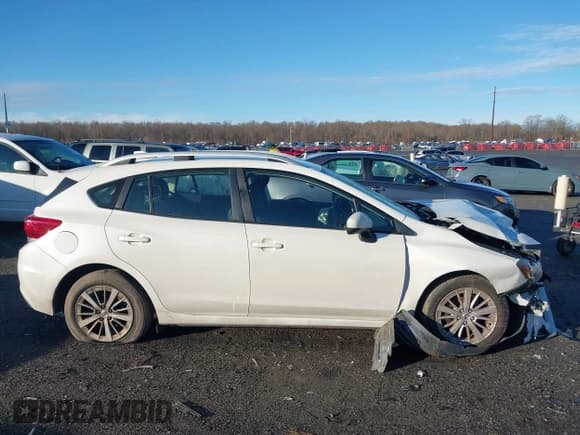 ✅ 2018 Subaru Impreza Premium • VIN: 4S3GTAB66J3741640 • Lot: 41193045. Listed on IAAI with 110,245 mi. Free auction sales archive from the USA and detailed vehicle history report at DreamBid. Image 13.