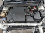 ✅ 2016 Lincoln MKZ • VIN: 3LN6L2GK1GR630717 • Lot: 85574925. Wystawiony na Copart z przebiegiem 109 827 mil. Bezpłatny archiwum sprzedaży aukcyjnych z USA i szczegółowy raport historii pojazdu na DreamBid. Zdjęcie 11.