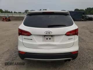 2014 Hyundai Santa Fe z VIN 5XYZU3LA9EG125162, wystawiony jako Copart lot #71719155 z przebiegiem 97 306 mil mil oraz Czysty tytuł • Clean title. Historia ofert i sprzedaży dostępna na DreamBid. Obrazek 6.