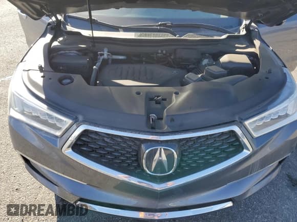 ✅ 2020 Acura MDX Technology • VIN: 5J8YD3H5XLL003940 • Лот: 66971654. Опубликован ранее на Copart с пробегом Не указан. Бесплатный доступ к архиву аукционных продаж из США и подробный отчёт об истории автомобиля на DreamBid. Изображение 14.