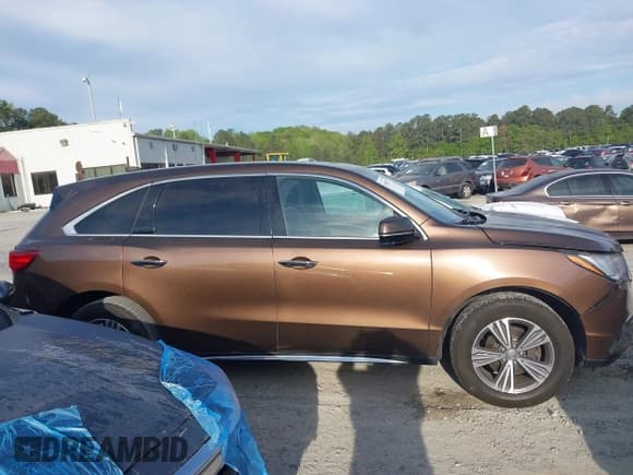 ✅ 2019 Acura MDX • VIN: 5J8YD3H33KL002920 • Lot: 41996777. Listed on IAAI with 129,410 mi. Free auction sales archive from the USA and detailed vehicle history report at DreamBid. Image 13.