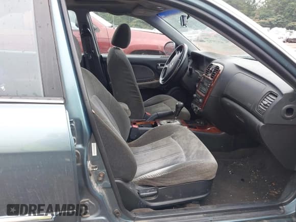 ✅ 2004 Hyundai Sonata GLS • VIN: KMHWF35H04A041801 • Lot: 42479712. Listed on IAAI with 153,666 mi. Free auction sales archive from the USA and detailed vehicle history report at DreamBid. Image 5.