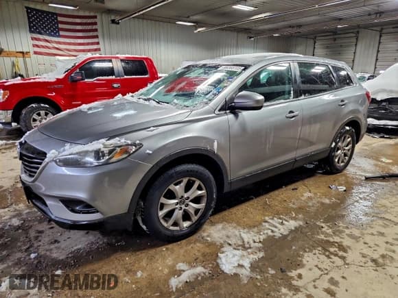✅ 2015 Mazda CX-9 Sport • VIN: JM3TB2BA2F0463184 • Lot: 96368105. Listed on Copart with 144,290 mi. Free auction sales archive from the USA and detailed vehicle history report at DreamBid. Image 1.