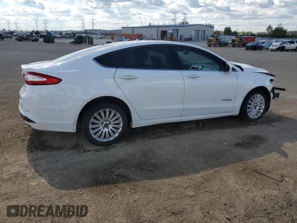 ✅ 2014 Ford Fusion SE Hybrid • VIN: 3FA6P0LU9ER272287 • Лот: 83995505. Опубликован ранее на Copart с пробегом Не указан. Бесплатный доступ к архиву аукционных продаж из США и подробный отчёт об истории автомобиля на DreamBid. Изображение 3.