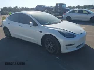 ✅ 2022 Tesla Model 3 Long Range • VIN: 5YJ3E1EB3NF246922 • Лот: 43735139. Опубликован ранее на IAAI с пробегом 145 759 миль. Бесплатный доступ к архиву аукционных продаж из США и подробный отчёт об истории автомобиля на DreamBid. Изображение 1.