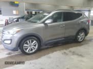 ✅ 2015 Hyundai Santa Fe • VIN: 5XYZWDLA4FG268392 • Lot: 52363955. Listed on Copart with 130,286 mi. Free auction sales archive from the USA and detailed vehicle history report at DreamBid. Image 1.