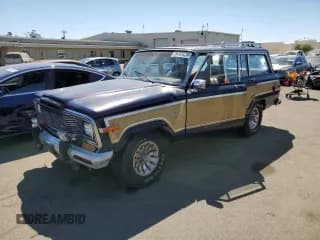 ✅ 1986 Jeep Grand Wagoneer • VIN: 1JCNJ15U0GT147723 • Lot: 69492824. Wystawiony na Copart z przebiegiem 98 610 mil. Bezpłatny archiwum sprzedaży aukcyjnych z USA i szczegółowy raport historii pojazdu na DreamBid. Zdjęcie 1.