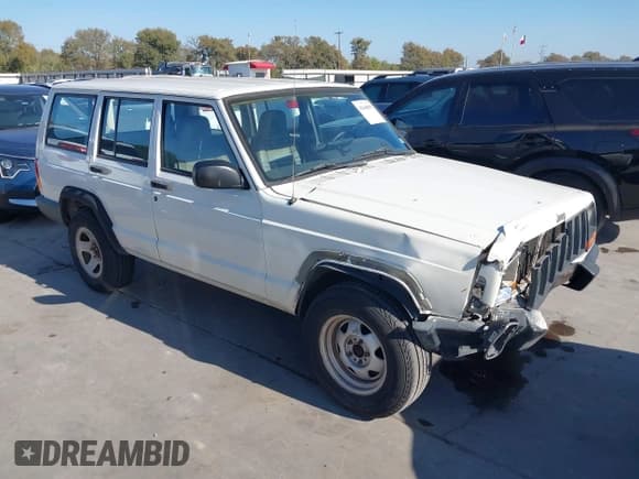 ✅ 1997 Jeep Cherokee • VIN: 1J4FT28S5VL610379 • Lot: 43648855. Listed on IAAI with 102,040 mi. Free auction sales archive from the USA and detailed vehicle history report at DreamBid. Image 1.