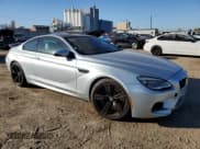 ✅ 2017 BMW M6 • VIN: WBS6J9C51HD934734 • Лот: 76123484. Опубликован ранее на Copart с пробегом 46 448 миль. Бесплатный доступ к архиву аукционных продаж из США и подробный отчёт об истории автомобиля на DreamBid. Изображение 4.