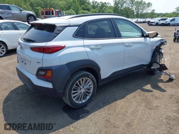 2021 Hyundai Kona SEL z VIN KM8K2CAA9MU615281, wystawiony jako IAAI lot #42403332 z przebiegiem 57 206 mil mil oraz . Historia ofert i sprzedaży dostępna na DreamBid. Obrazek 4.