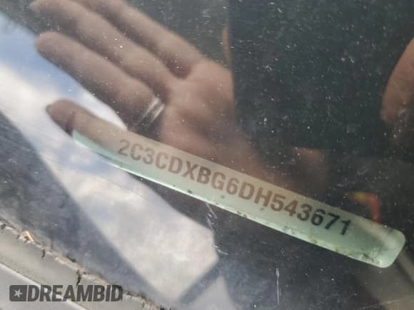 ✅ 2013 Dodge Charger SE • VIN: 2C3CDXBG6DH543671 • Lot: 92074325. Listed on Copart with 155,729 mi. Free auction sales archive from the USA and detailed vehicle history report at DreamBid. Image 12.