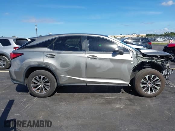 ✅ 2020 Lexus RX 350 • VIN: 2T2AZMAA2LC165451 • Lot: 43664524. Listed on IAAI with 103,122 mi. Free auction sales archive from the USA and detailed vehicle history report at DreamBid. Image 14.