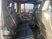 ✅ 2022 Jeep Wrangler Unlimited Sahara • VIN: 1C4HJXEG8NW164969 • Lot: 61671095. Listed on Copart with 64,263 mi. Free auction sales archive from the USA and detailed vehicle history report at DreamBid. Image 11.