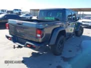 ✅ 2023 Jeep Gladiator Mojave • VIN: 1C6JJTEGXPL517914 • Lot: 43666074. Listed on IAAI with 33,445 mi. Free auction sales archive from the USA and detailed vehicle history report at DreamBid. Image 4.