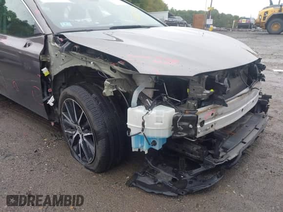 2021 Toyota Camry SE with VIN 4T1G11BK4MU028944, listed as a IAAI auction lot 43275174 with 82,954 mi miles and . Bid and sale history available at DreamBid. Image 6.