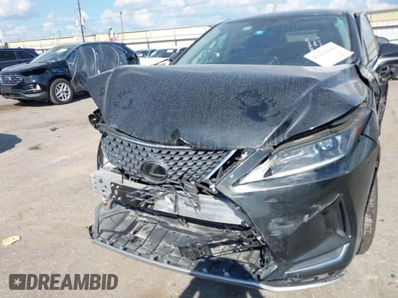 ✅ 2022 Lexus RX 350 • VIN: 2T2AZMAAXNC223938 • Lot: 43269444. Listed on IAAI with 60,860 mi. Free auction sales archive from the USA and detailed vehicle history report at DreamBid. Image 6.