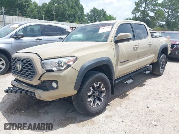 ✅ 2020 Toyota Tacoma SR5 • VIN: 5TFDZ5BN9LX053384 • Лот: 42648470. Опубликован ранее на IAAI с пробегом 48 229 миль. Бесплатный доступ к архиву аукционных продаж из США и подробный отчёт об истории автомобиля на DreamBid. Изображение 2.