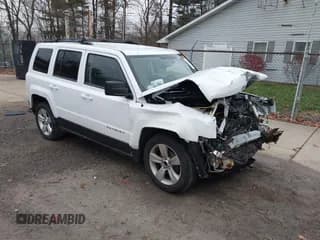 ✅ 2014 Jeep Patriot Latitude • VIN: 1C4NJPFB5ED533403 • Lot: 43738438. Listed on IAAI with 176,057 mi. Free auction sales archive from the USA and detailed vehicle history report at DreamBid. Image 1.