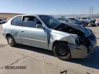 2005 Hyundai Accent GLS with VIN KMHCG35C55U337255, listed as a Copart auction lot 43761985 with 192,585 mi miles and Salvage title. Bid and sale history available at DreamBid. Image 4.