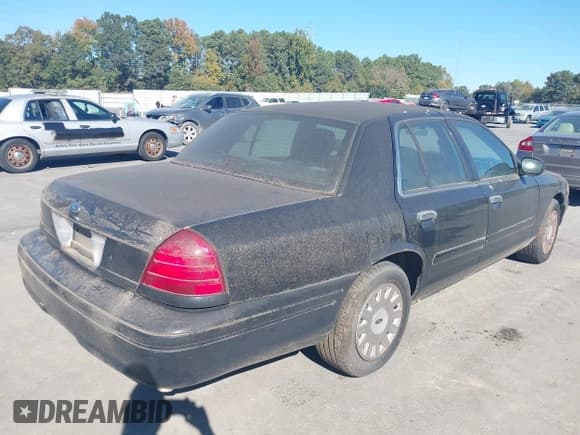 ✅ 2003 Ford Police Interceptor Street Appear • VIN: 2FAHP71W13X162905 • Lot: 43422741. Listed on IAAI with 180,194 mi. Free auction sales archive from the USA and detailed vehicle history report at DreamBid. Image 4.