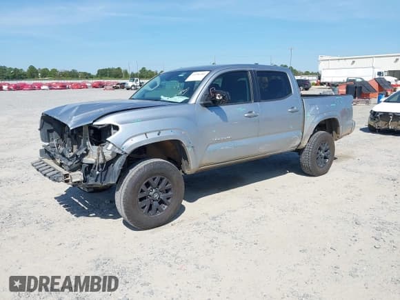 ✅ 2022 Toyota Tacoma TRD Sport • VIN: 3TMAZ5CN8NM168388 • Lot: 43206302. Listed on IAAI with 68,076 mi. Free auction sales archive from the USA and detailed vehicle history report at DreamBid. Image 2.
